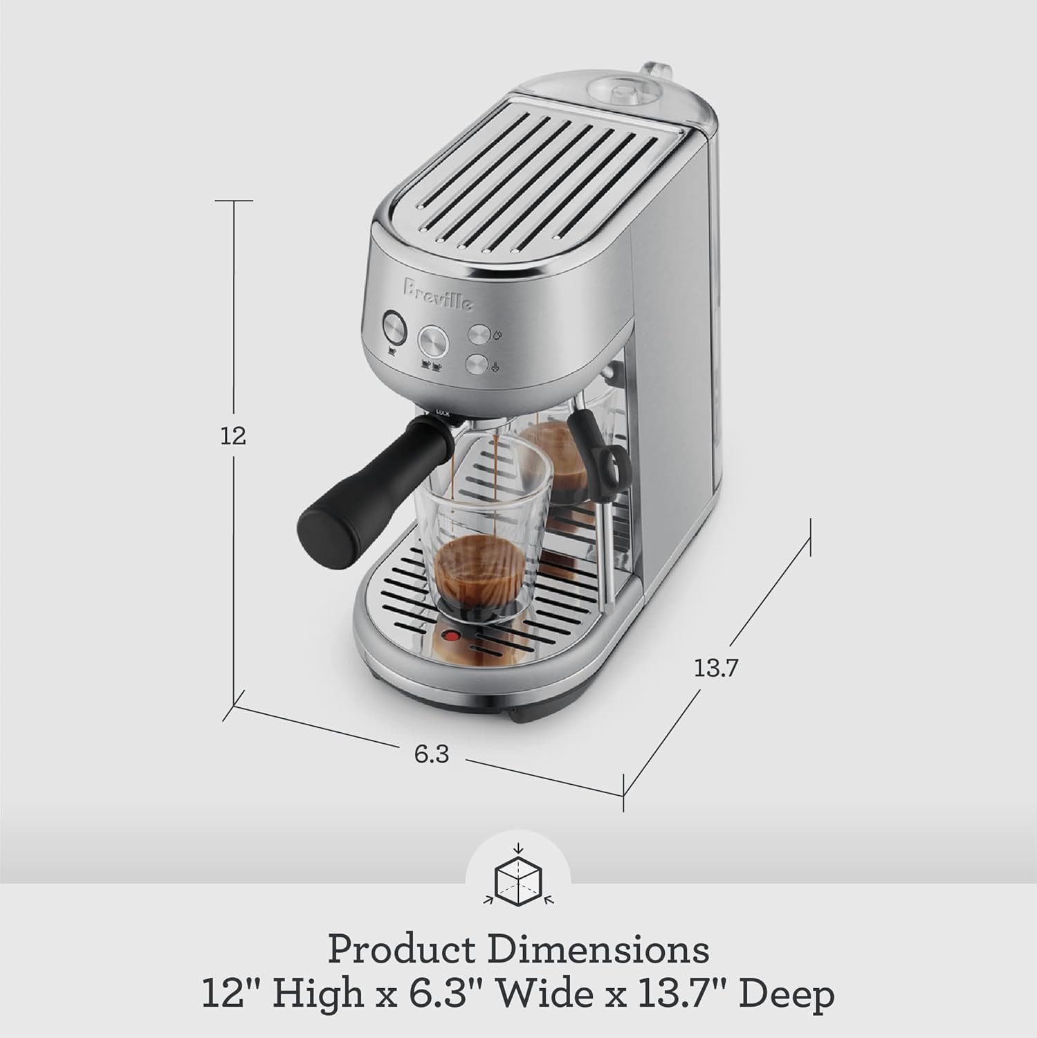 Breville Bambino BES450 side view showing the compact 6.3 inch wide and 12 inch tall dimensions, with a shot pulling into a glass